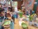 Drei Kinder sitzen am Tisch, welcher mit Osterdekoration geschmückt ist und haben einen Teller vor sich stehen.