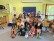 Gruppenbild mit vielen Kindern und drei Lehrerinnen im Gruppenraum